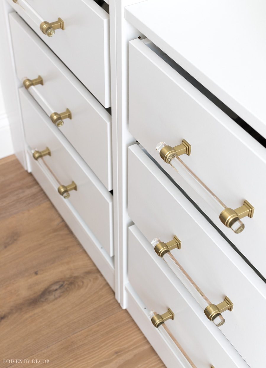 LOVE these acrylic and brass drawer pulls so much!