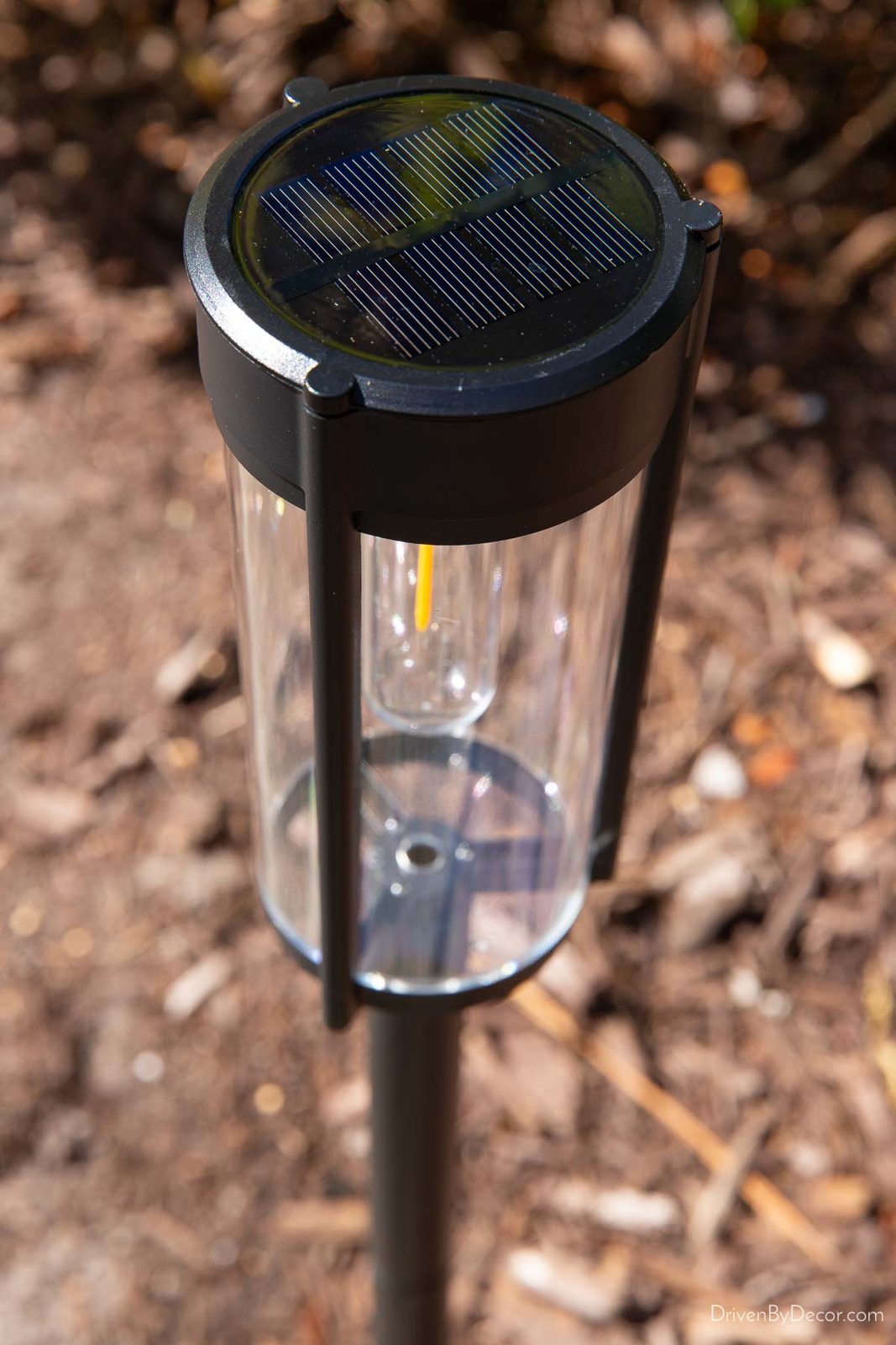 Solar panel on top of solar powered walkway light
