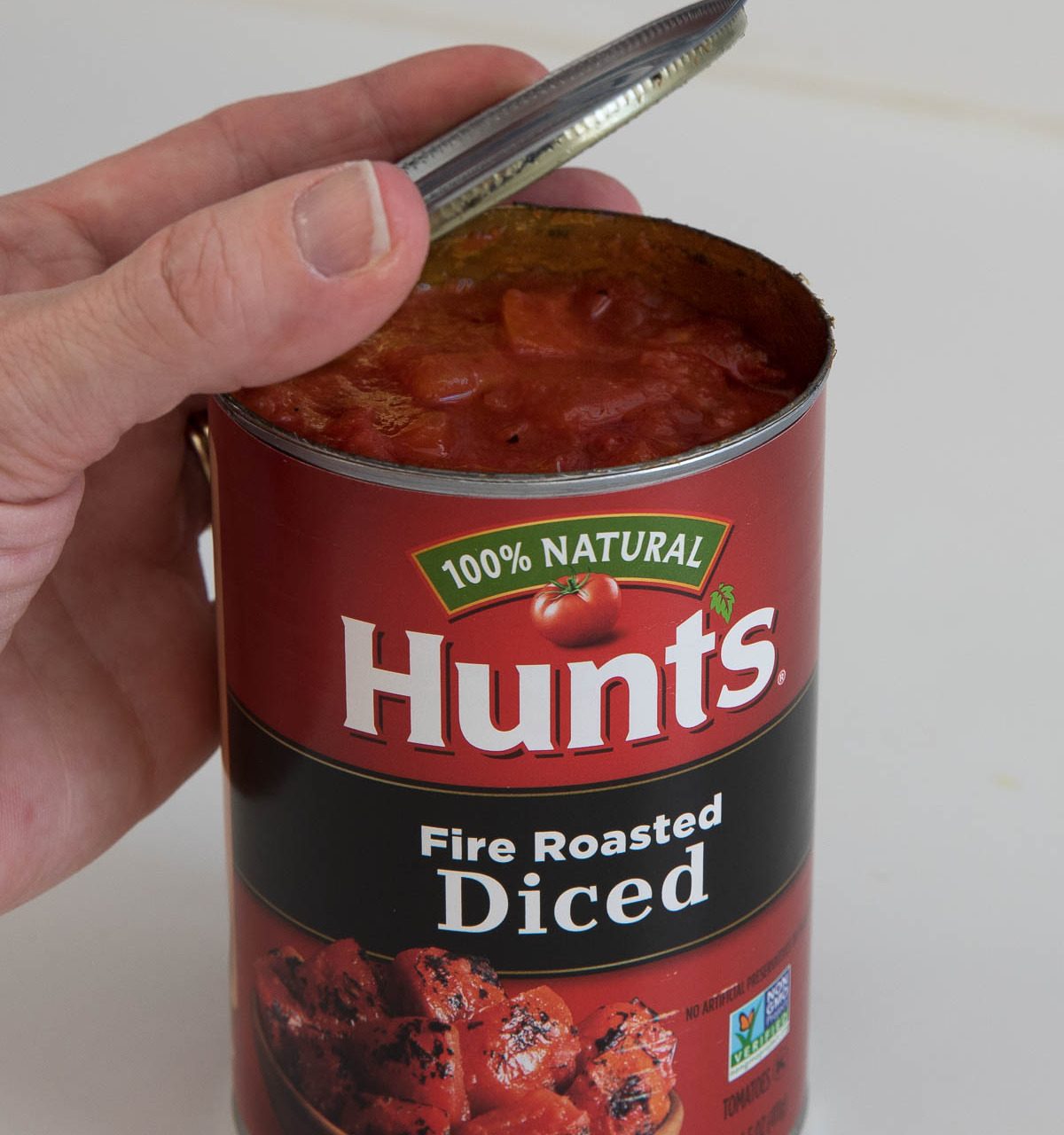 Love how this can opener cuts under the edge of the lid so you can place it back on top in the fridge!