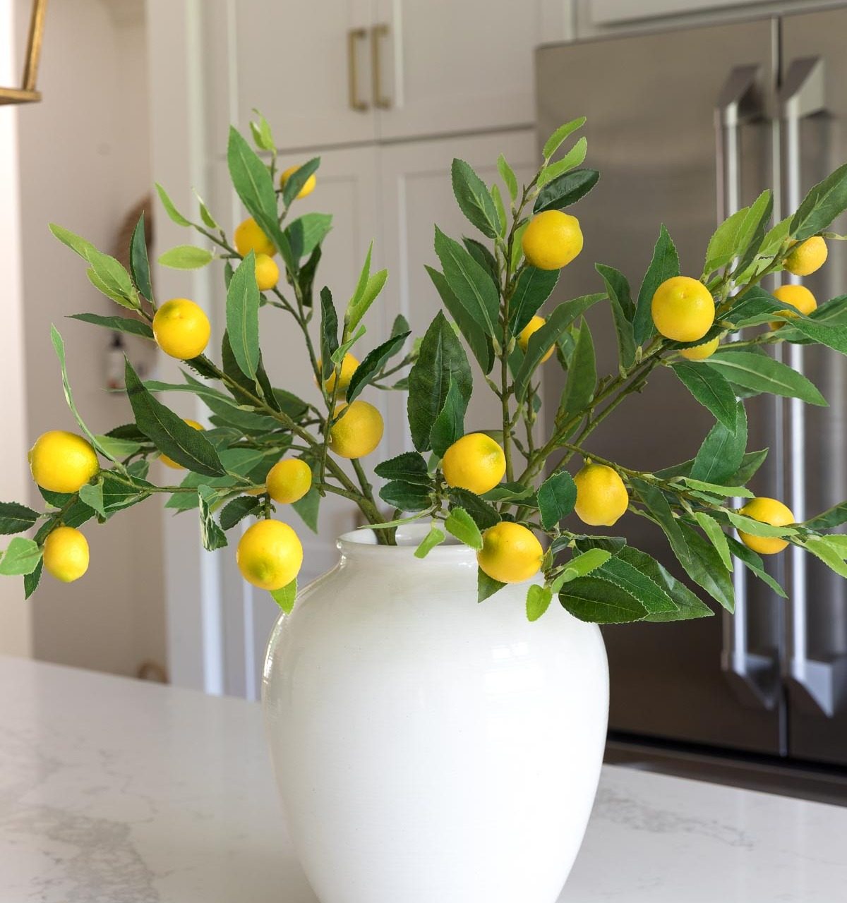 Love these artificial lemon branches! More on these and other great artificial flowers are in this post!