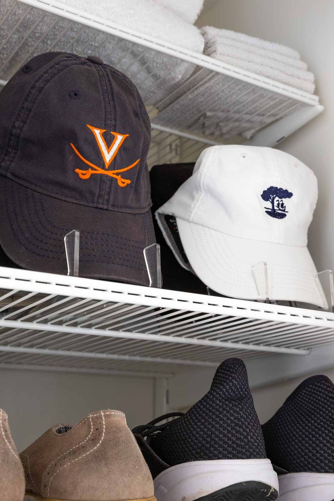 Cap organizers in laundry room closet