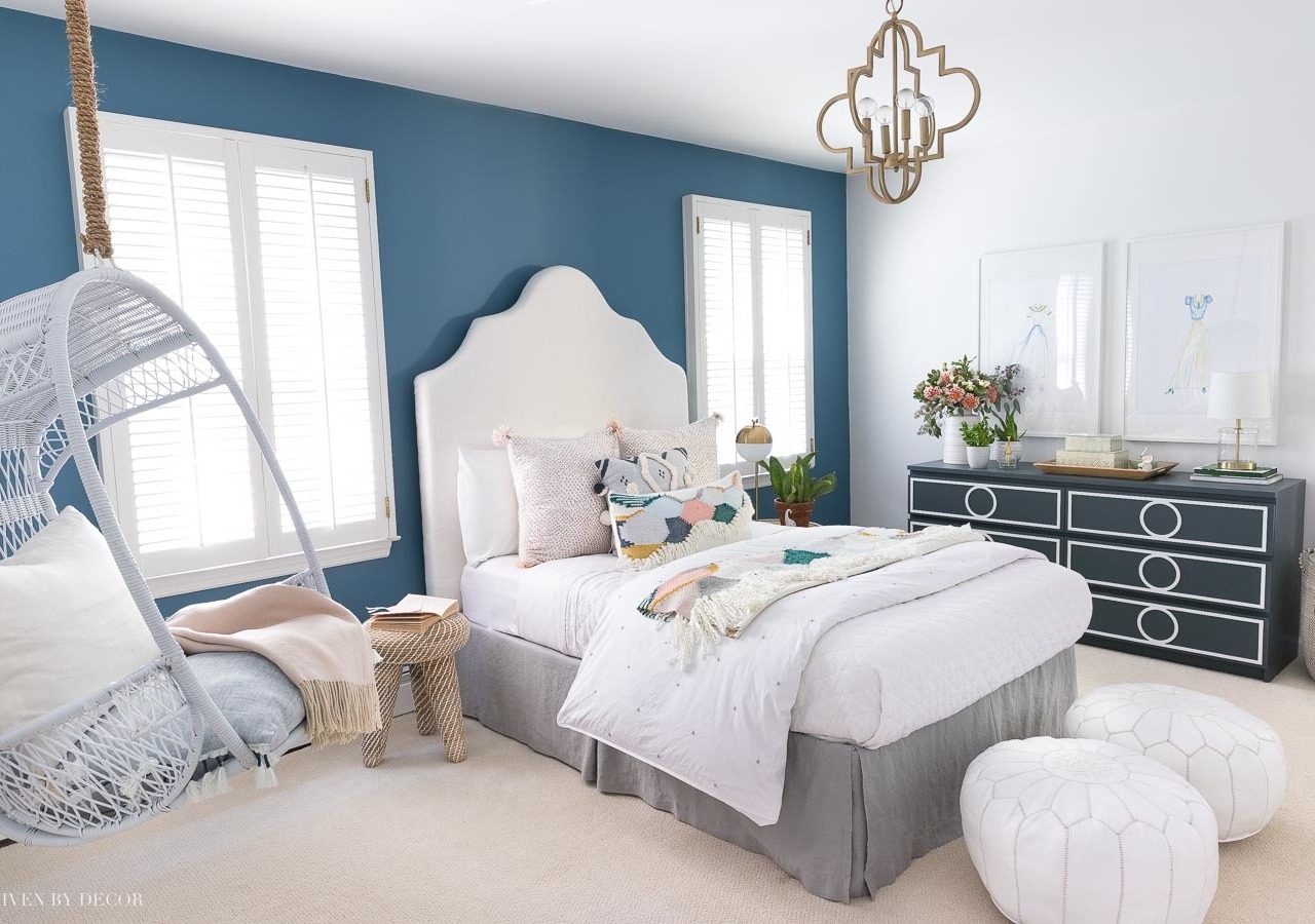 Love the blue accent wall (Behr Marquee's Blueprint paint color) in this boho chic bedroom!