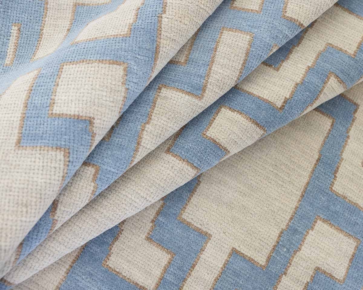 Blue and tan Oushak rug