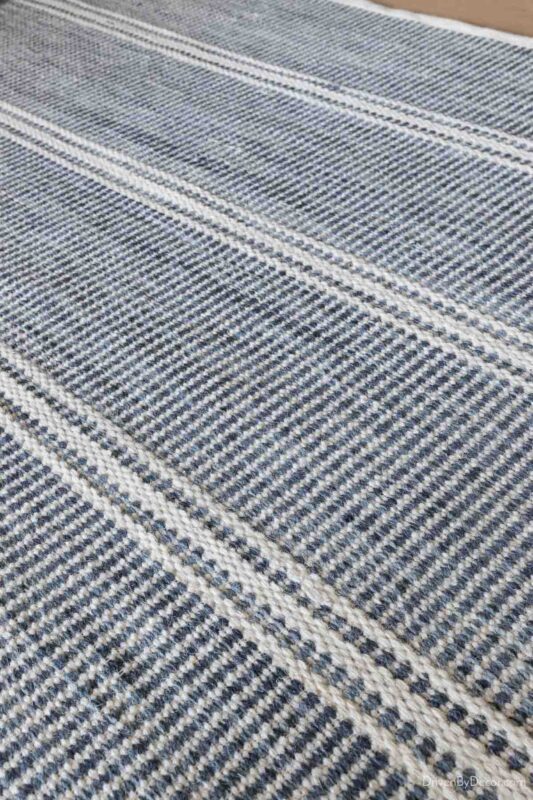 Blue and white striped rug