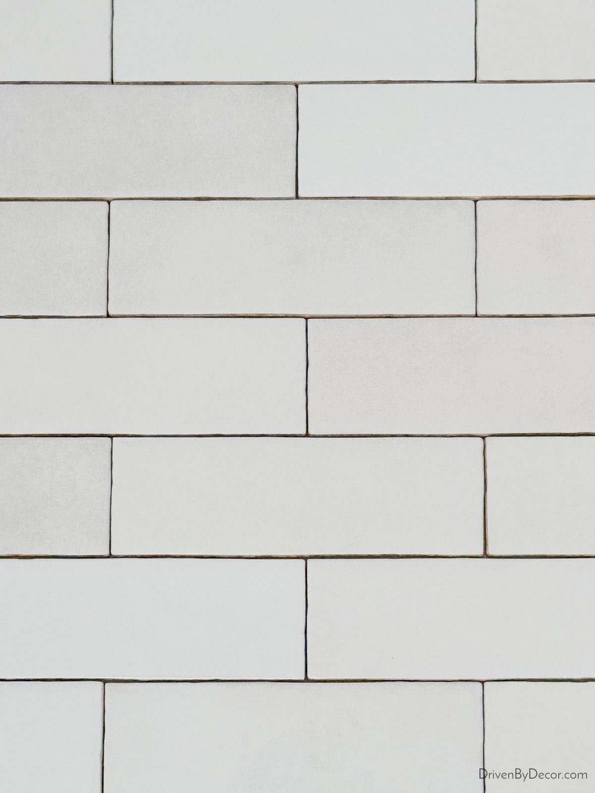 Subway tile laid in brick pattern