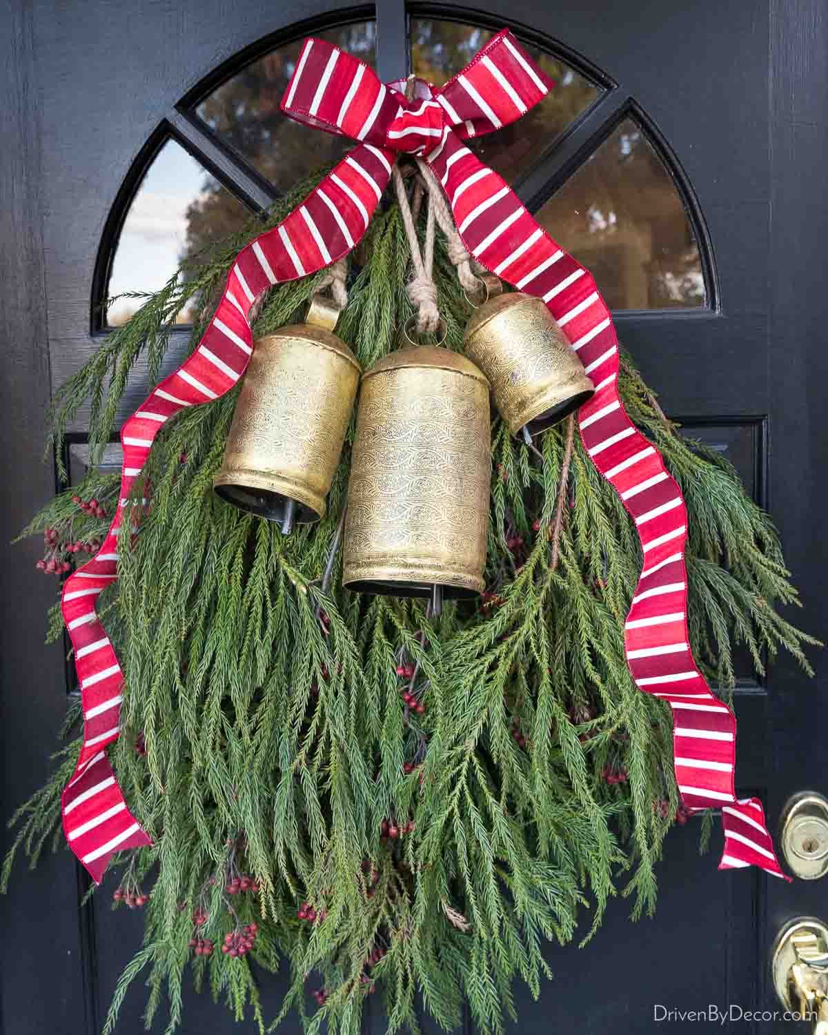Love these gorgeous etched bells used as part of a holiday swag!