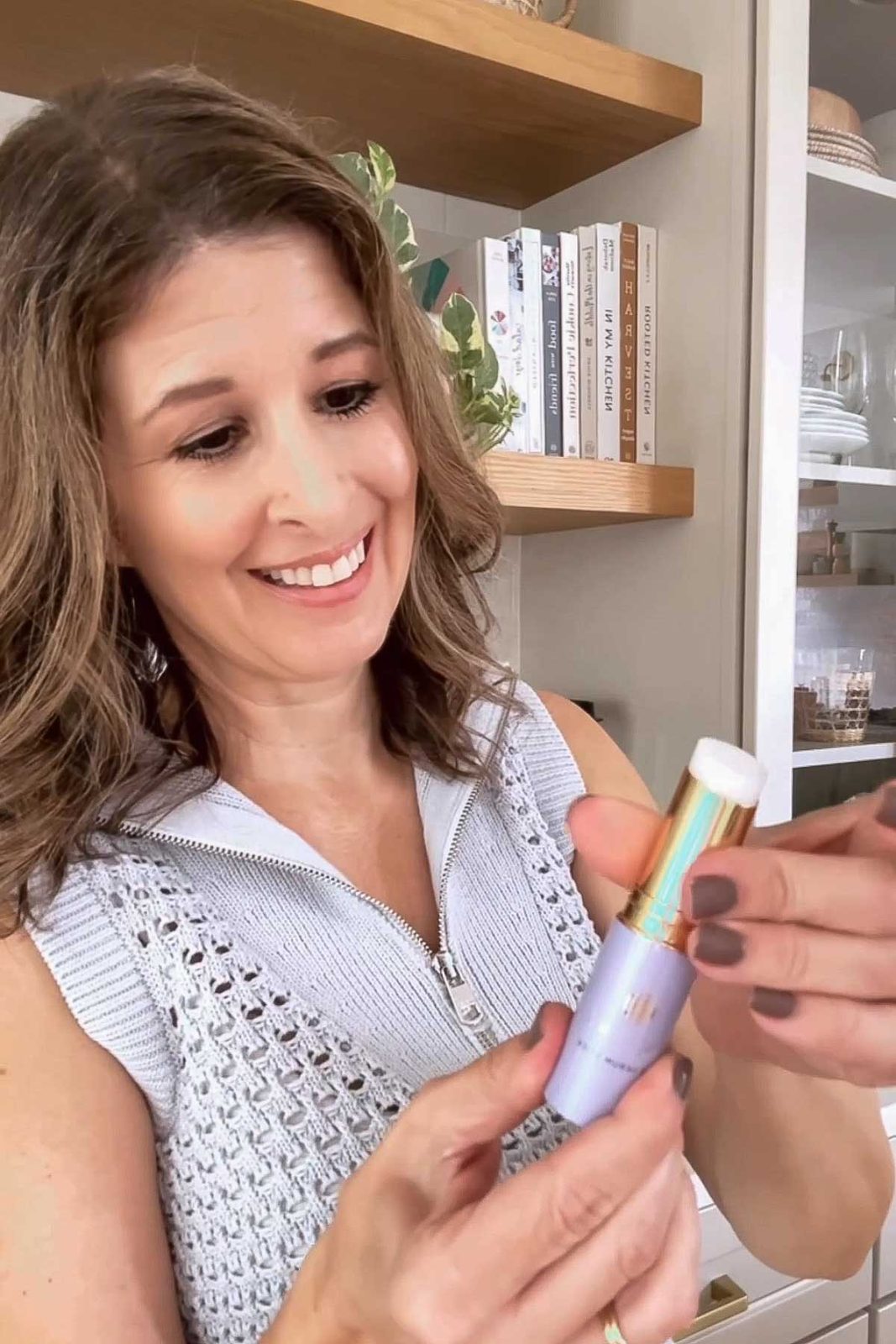 Holding Tatcha serum stick
