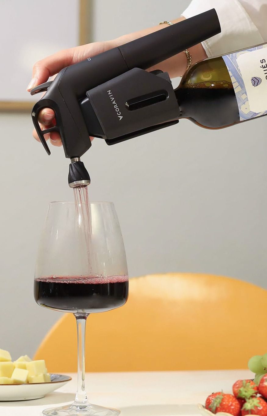 Wine preservation system attached to wine bottle to pour a glass
