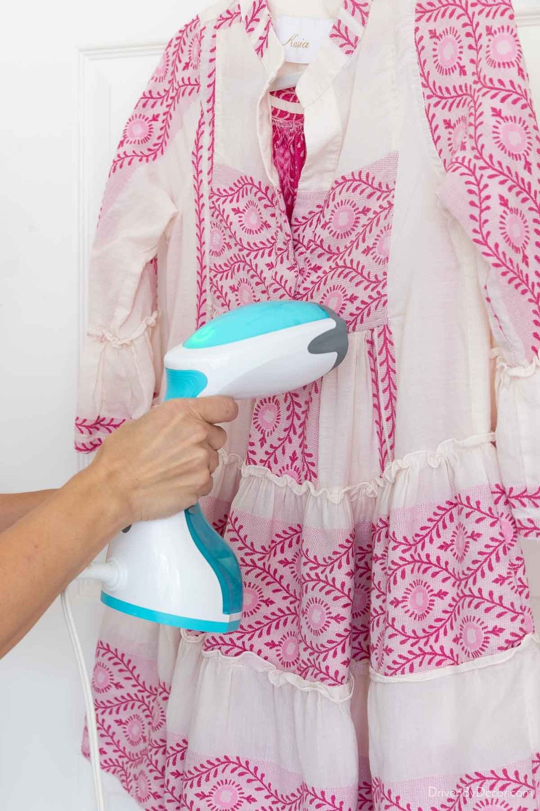 Clothes steamer steaming dress