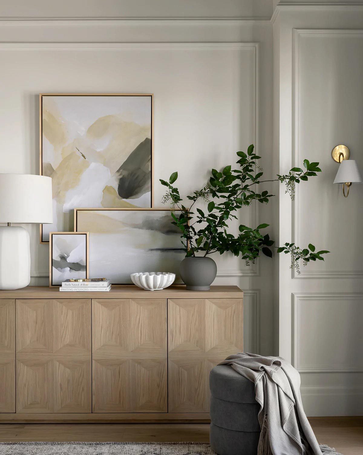 Layered art on sideboard