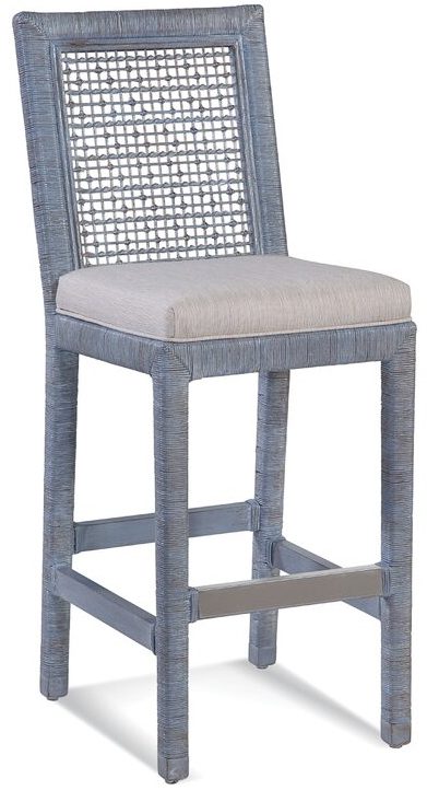 This rattan counter stool comes in a ton of gorgeous frame colors and upholstered cushion options!