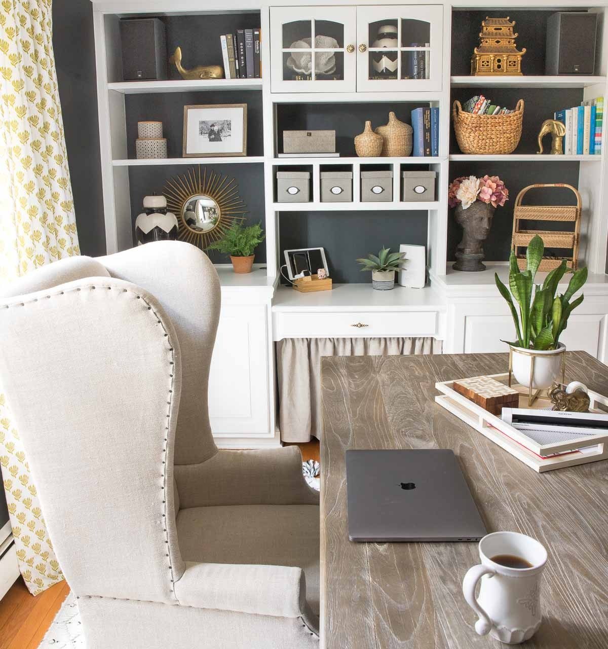 I always keep a tray on our office desk to corral the clutter - one of the many desk organization ideas in this post!