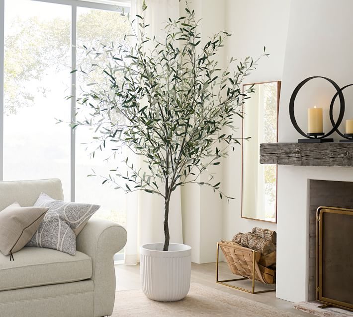 A faux olive tree that would make a great addition to a dining room