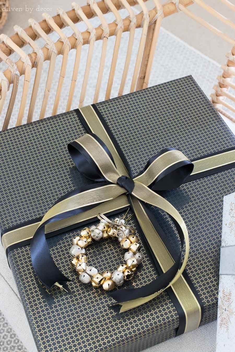 Love this idea of layering two ribbons to add a luxurious look to your gift! One of many easy gift wrapping ideas for Christmas presents in this post!