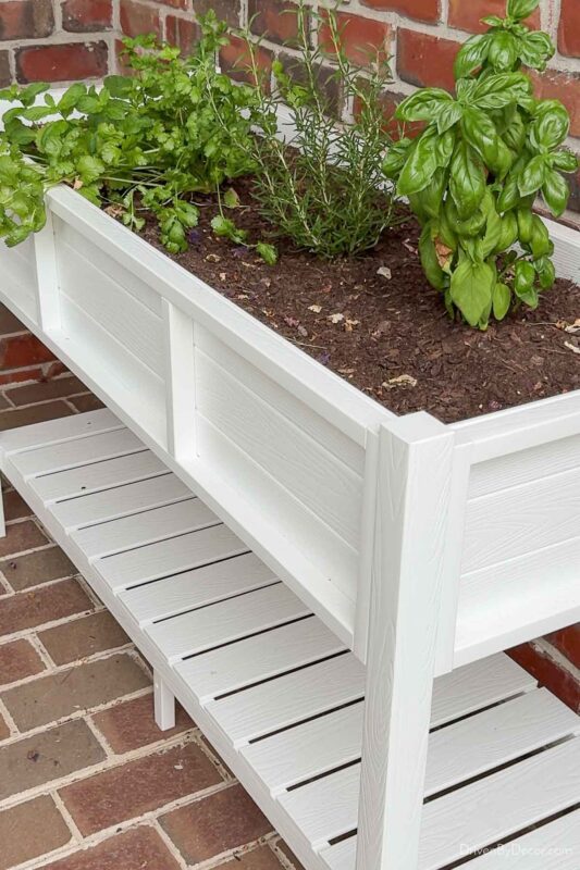 Elevated white outdoor planter