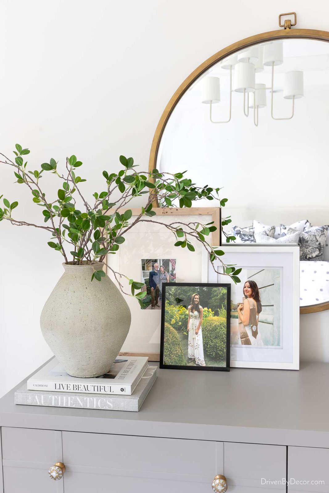 Family photos in overlapping frames as bedroom decor