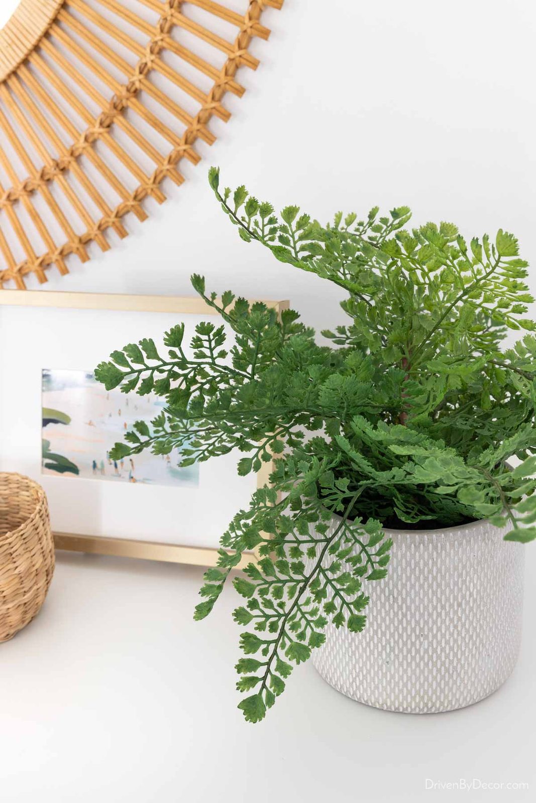 Faux fern as dresser decor