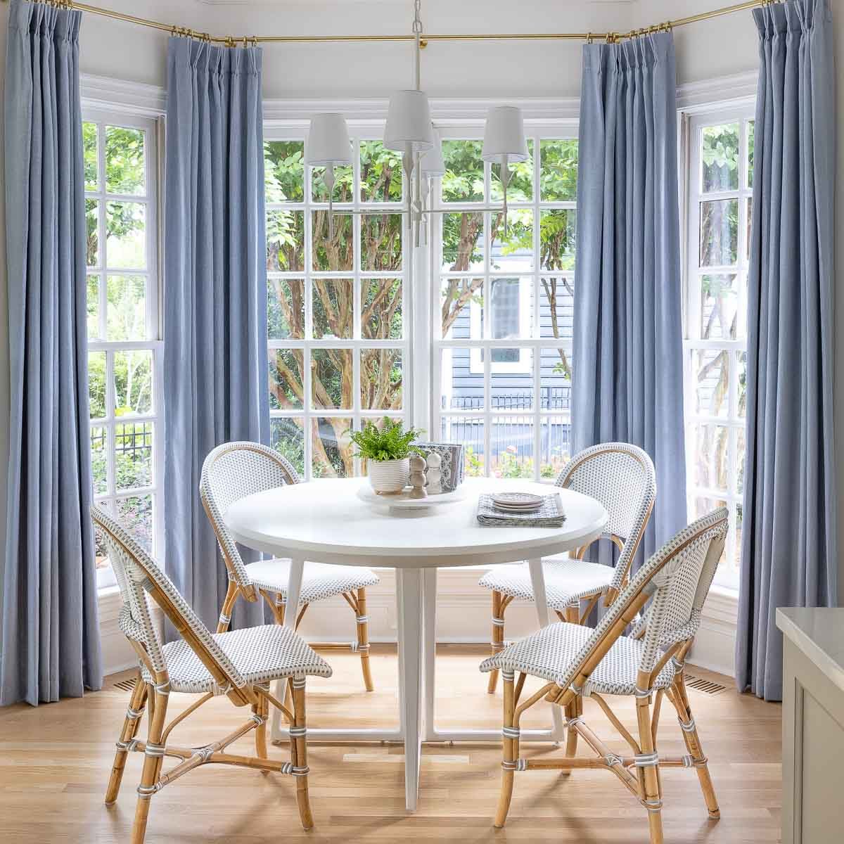 How to hang curtains in a bay window