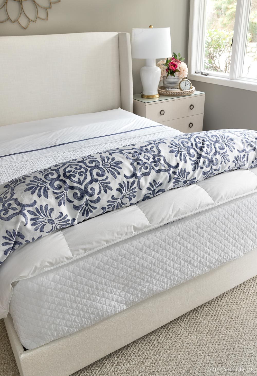 The simple way to put your duvet cover over your insert