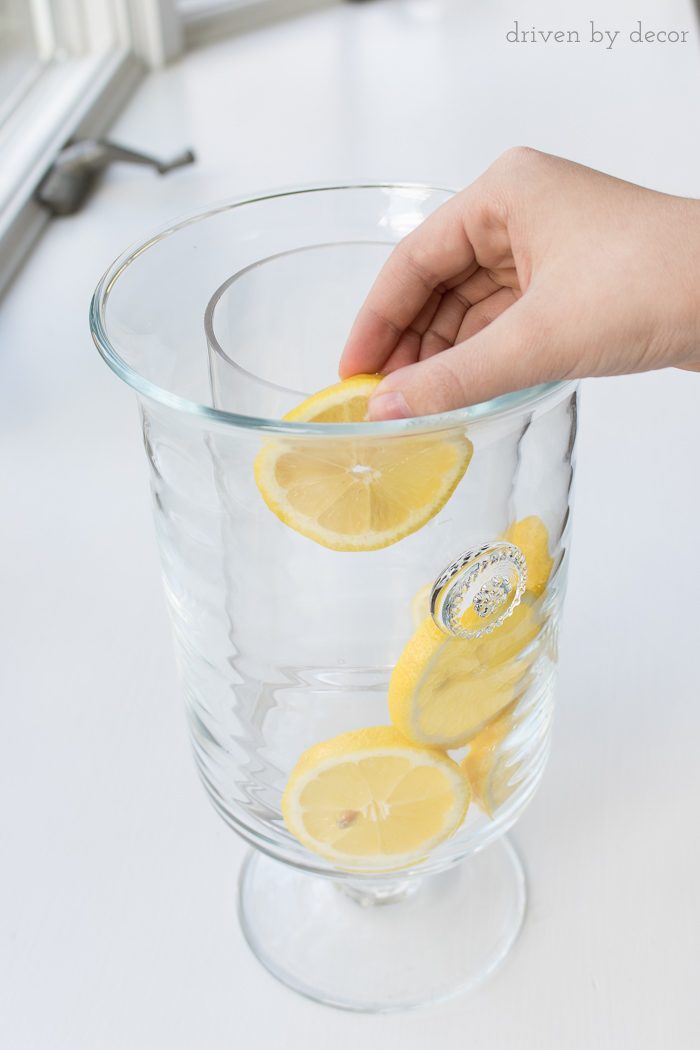 The trick for how to line a vase with lemons to create a beautiful floral centerpiece!