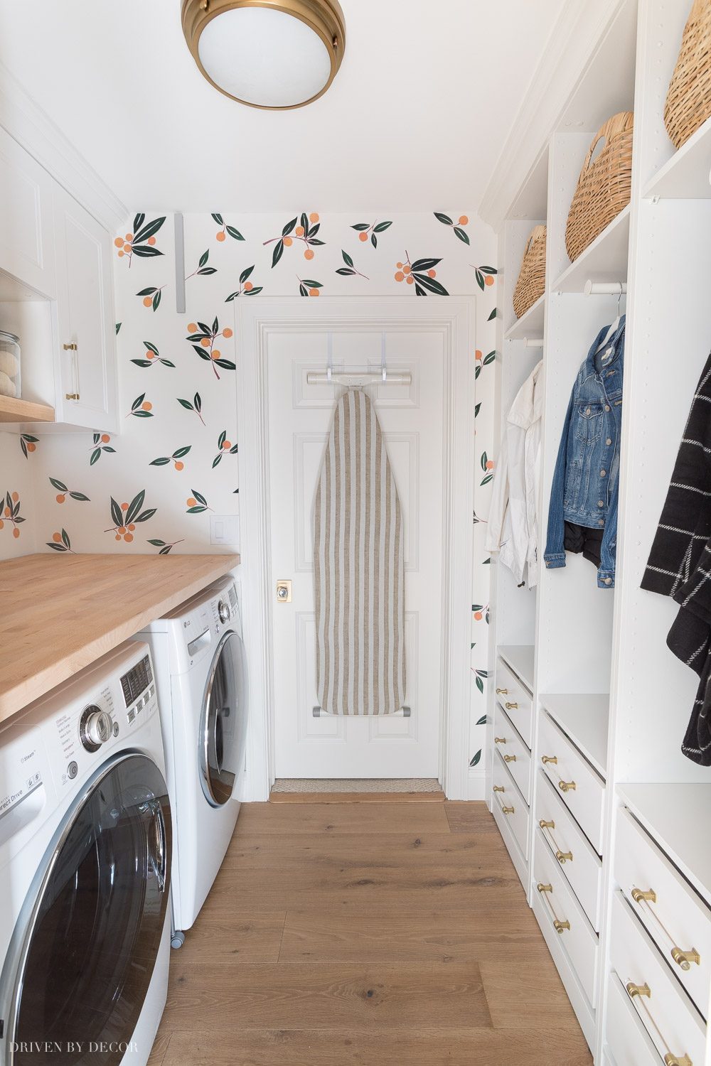 We transformed the look of our laundry room with Ikea cabinets and wardrobes!