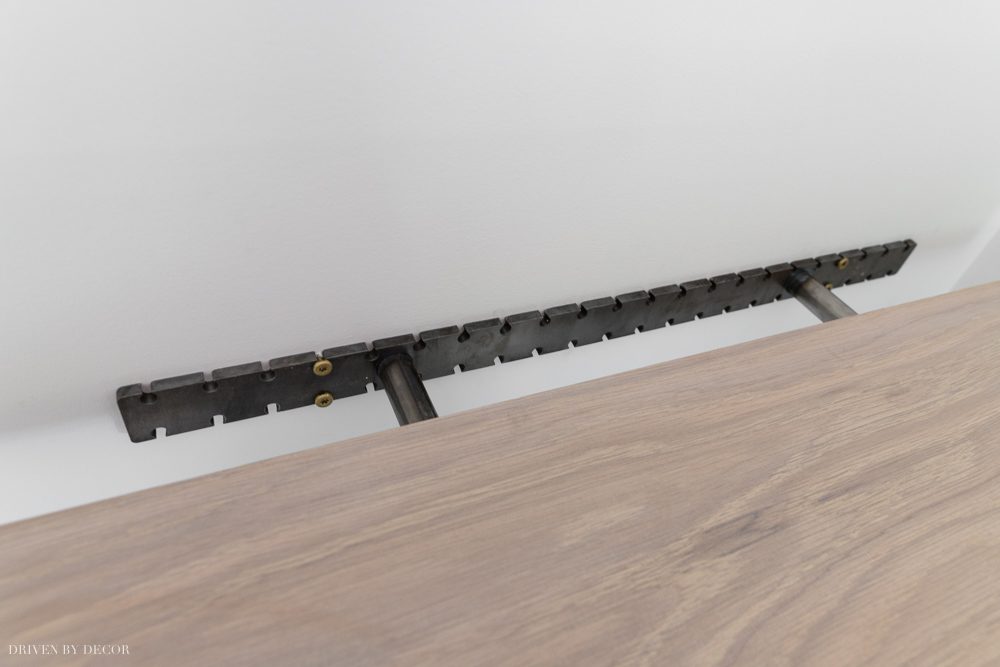 Installing our floating wood shelves!