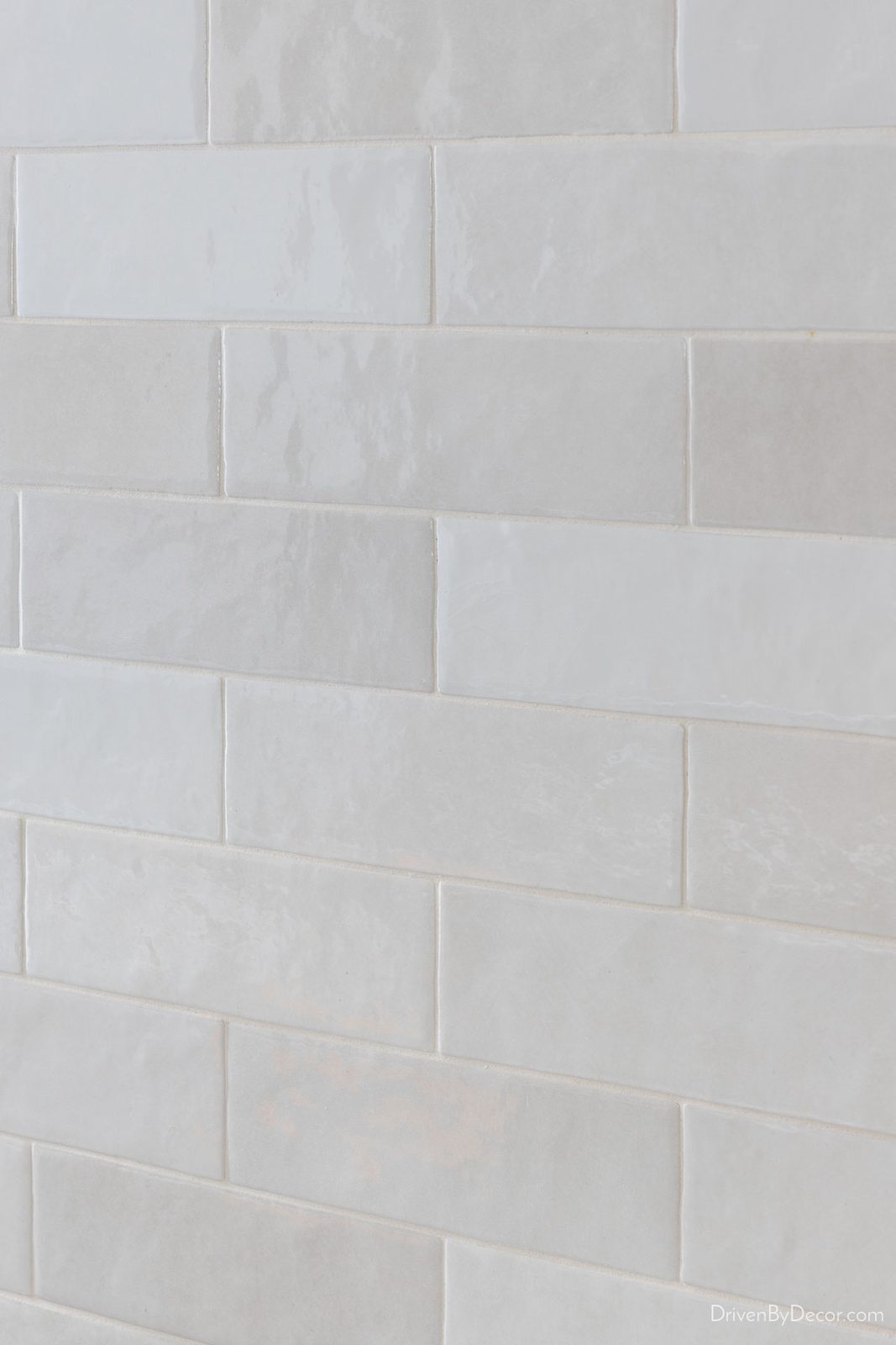 Polished subway tile on kitchen backsplash