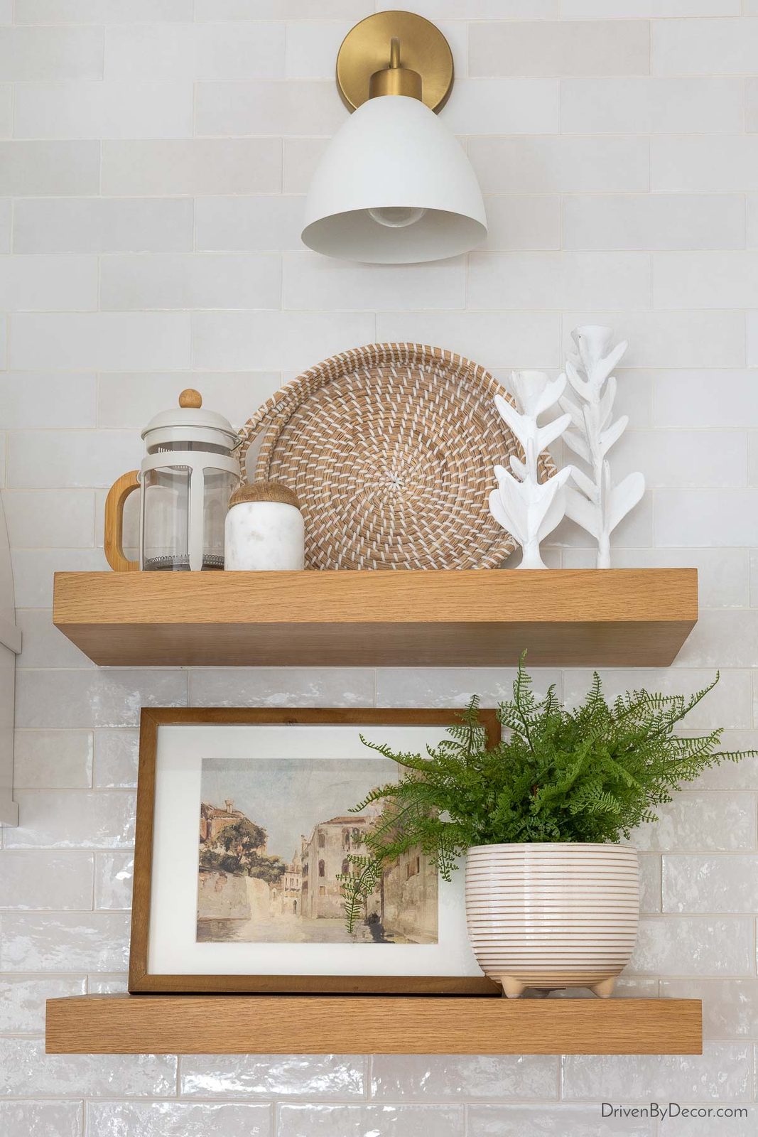 Pair of white oak floating wood shelves in kitchen