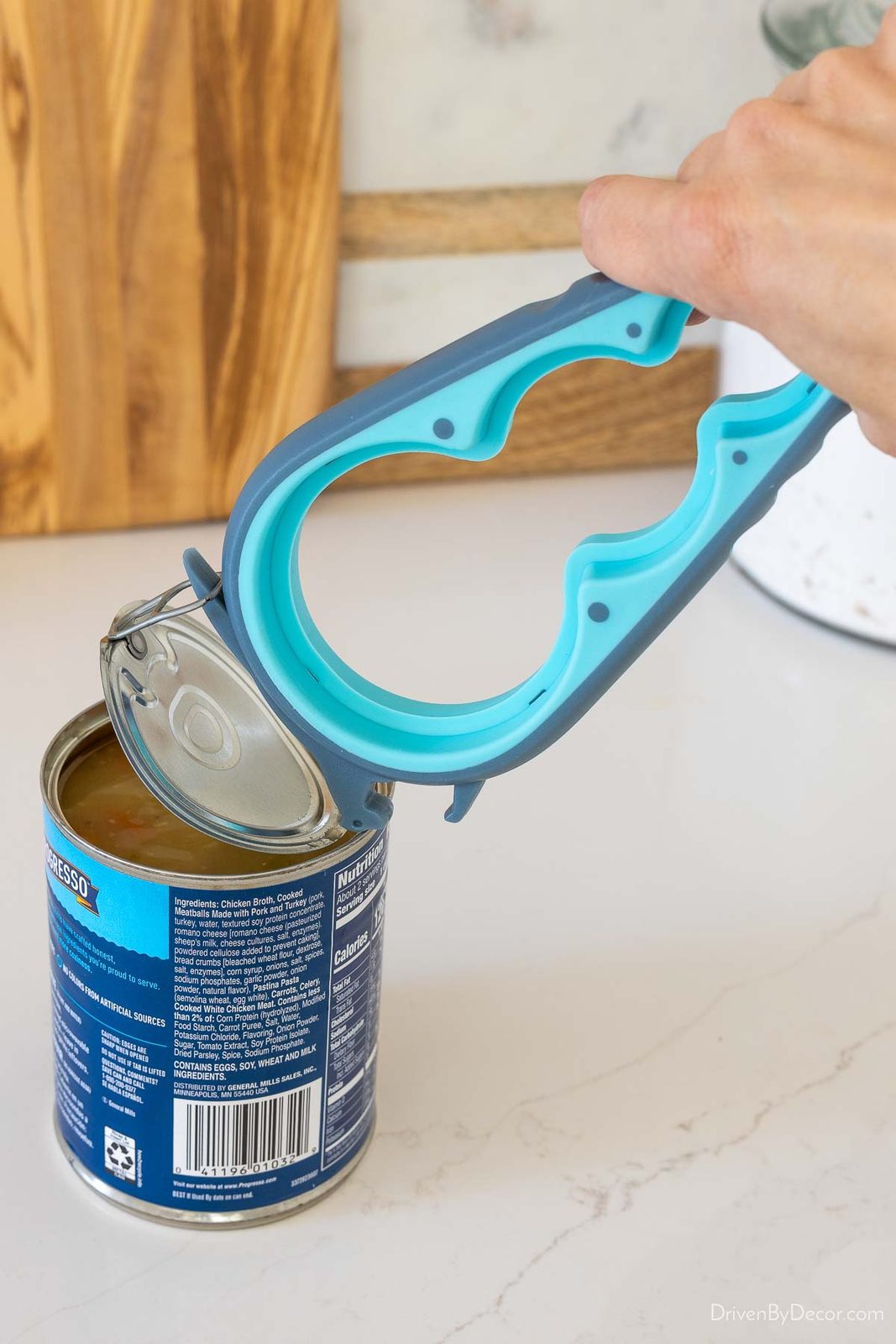 Kitchen gadget that opens jars and pull tab cans