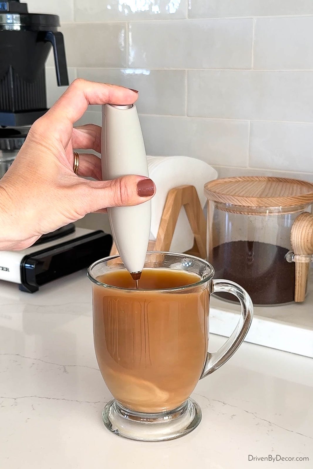 Using a milk frother on coffee