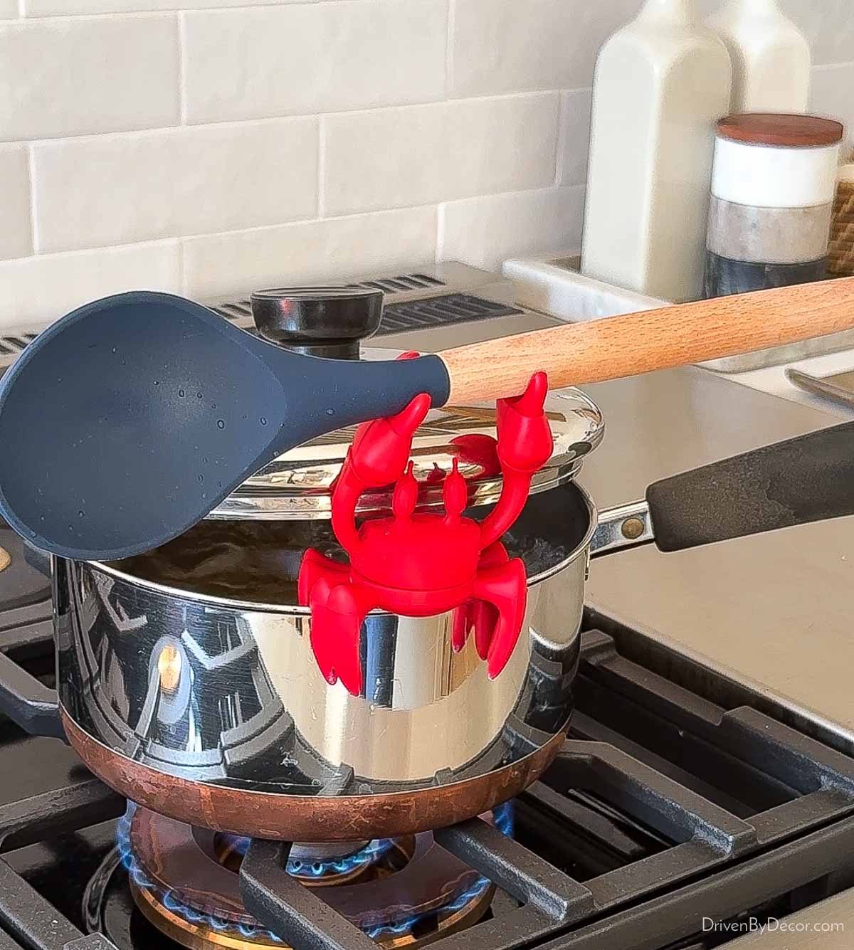 Crab that's both a steam releaser and spoon holder - such a fun kitchen gadget!