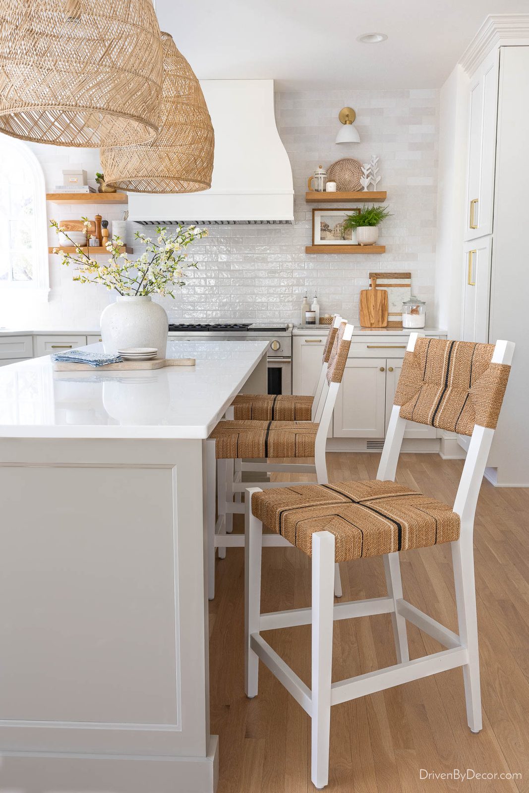 Woven kitchen counter stools at our island