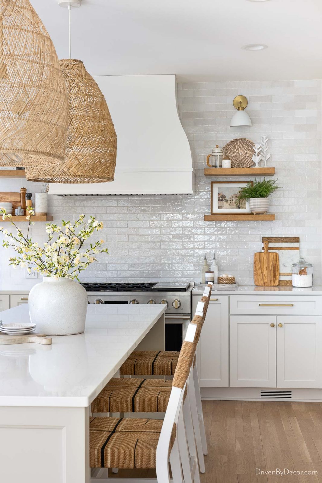 Remodeled kitchen with new range hood and floating shelves