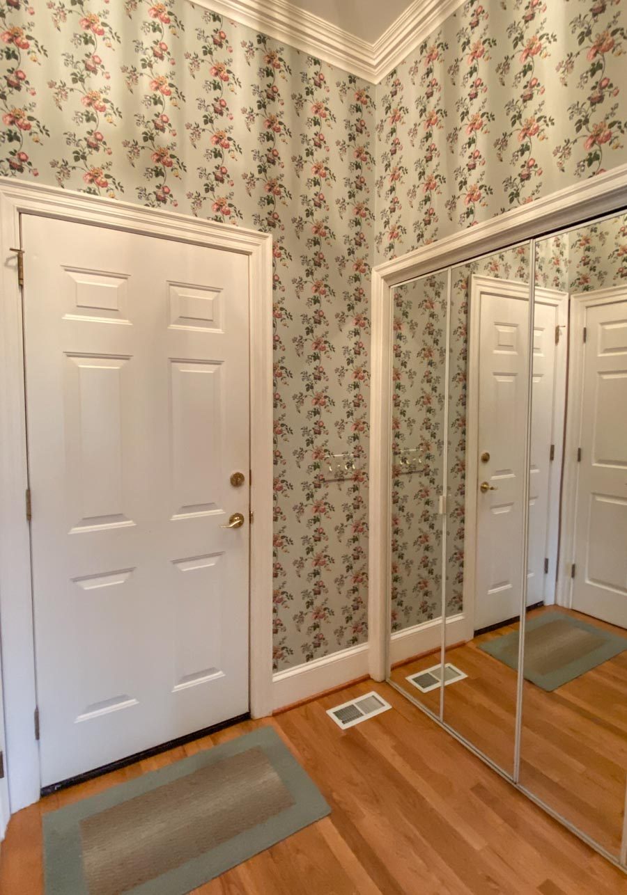 Our laundry room before taking the wallpaper down