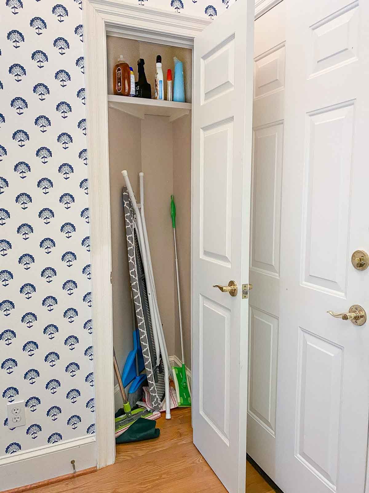 Our laundry room closet before adding organizers