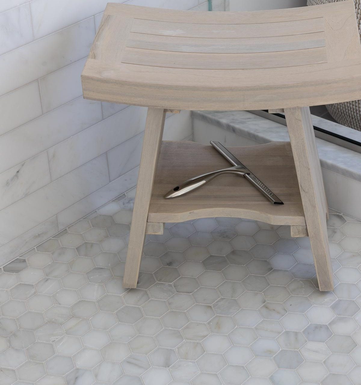 This squeegee is a must-have for keeping marble tile clean in bathrooms!