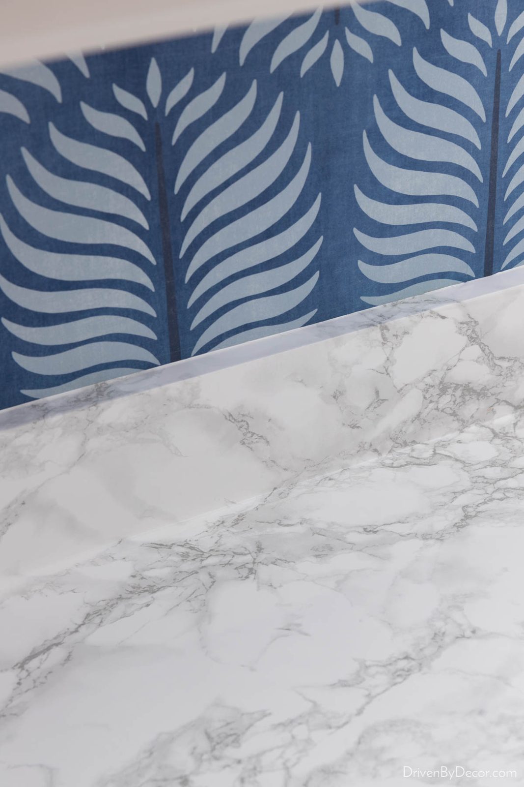 Seam between our contact paper countertops and backsplash