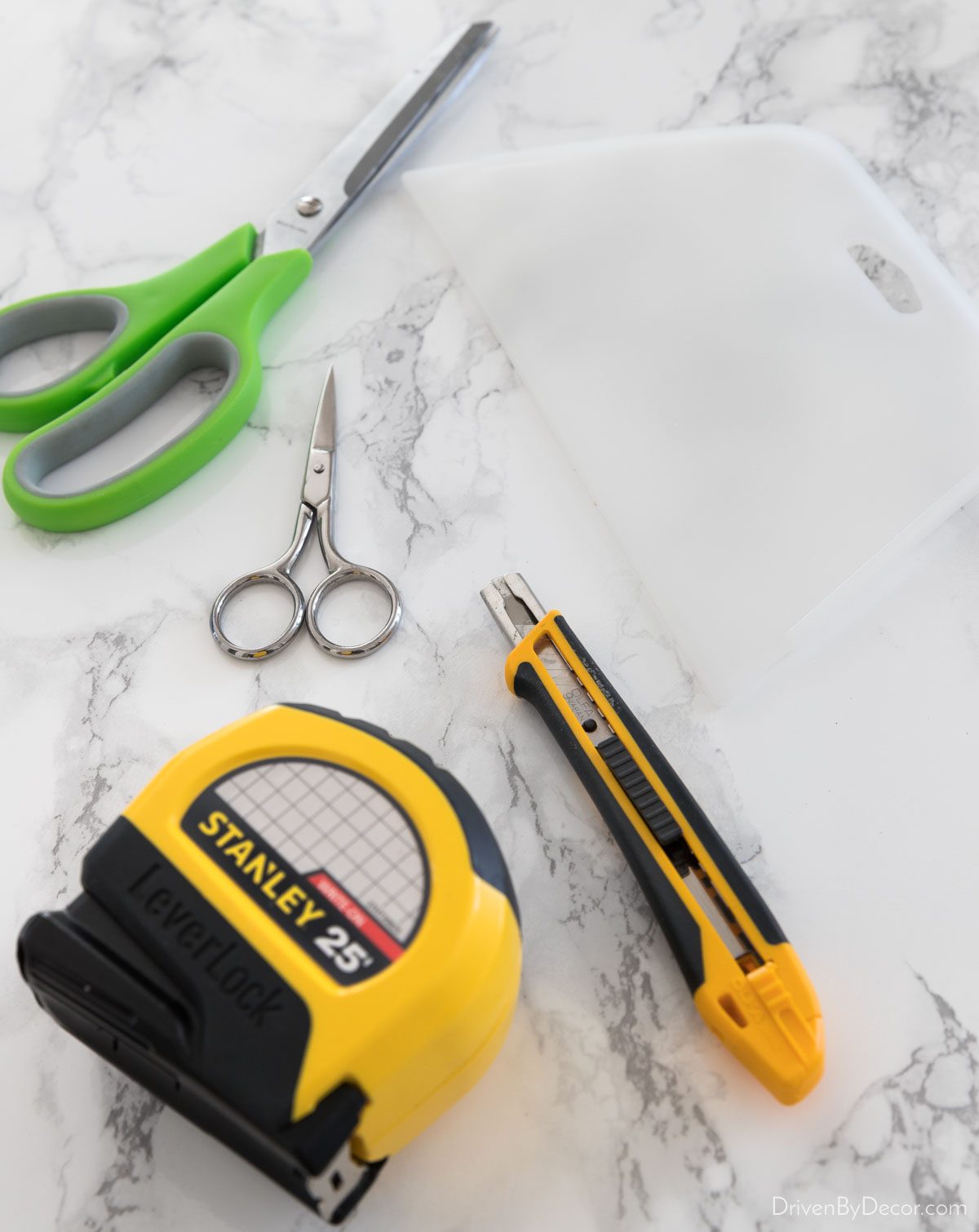 Supplies for covering countertops with contact paper