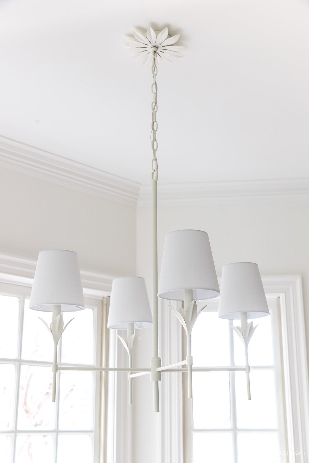 Matte white chandelier over our kitchen table