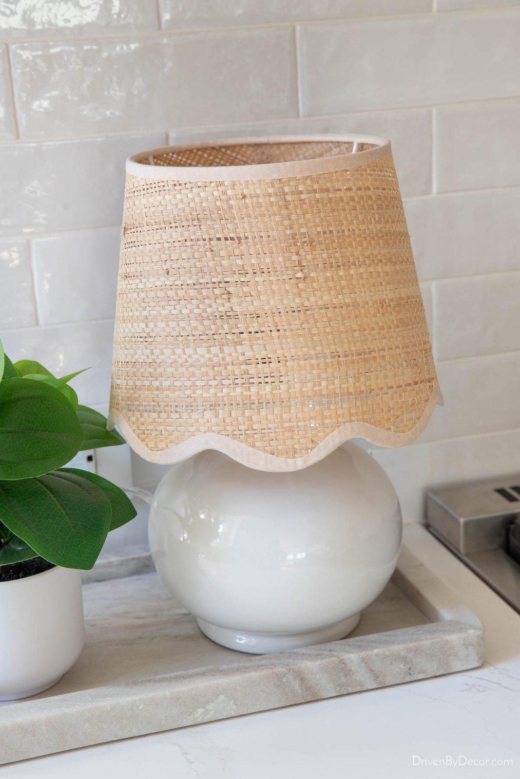 Mini white lamp with scalloped woven shade