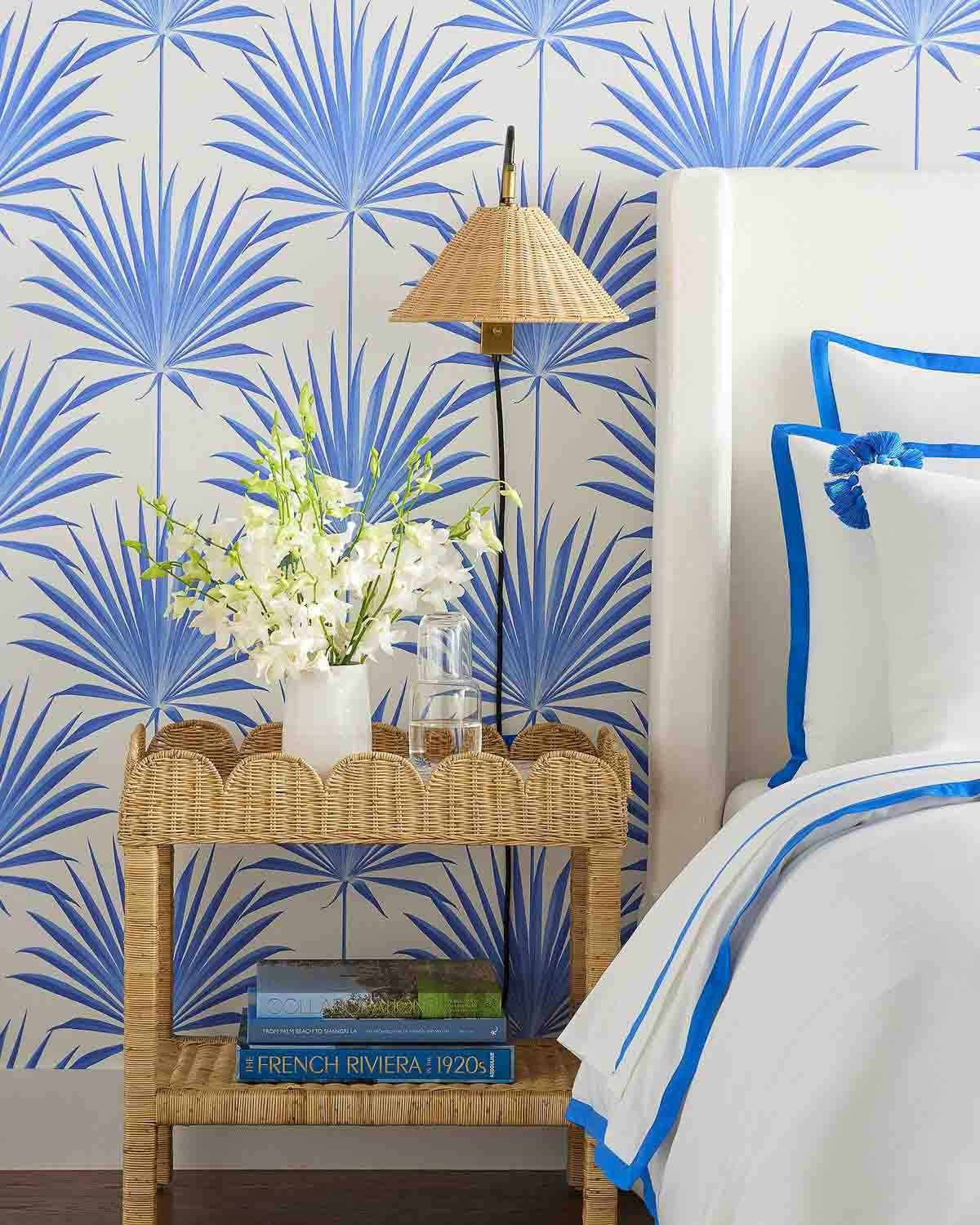 Books on nightstand shelf in bedroom