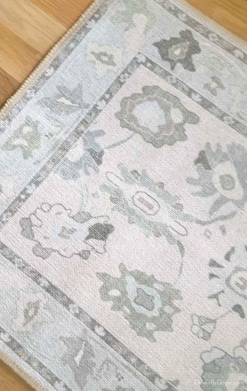 Oushak style rug in cream, pale blue, and pale green