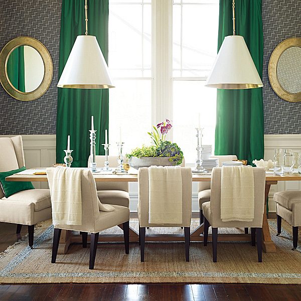 LOVE the look of this pair of cone pendants over a dining table!