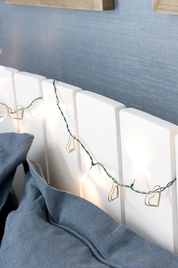 Gold paperclip hearts added to a strand of twinkle lights for a simple, sparkly Valentine's Day garland