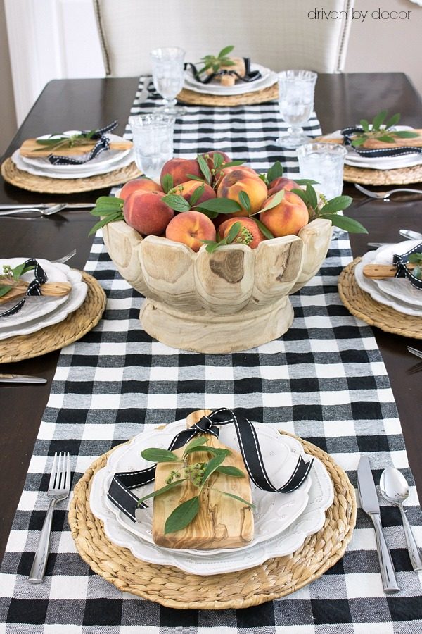 Peaches make a stunningly simple fall centerpiece in this beautiful scalloped wood bowl!