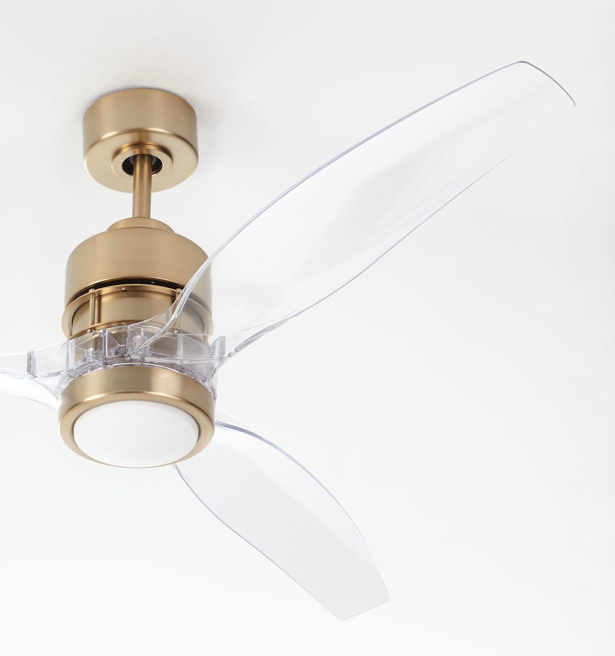 Such a pretty ceiling fan with a satin brass base and acrylic fan blades!