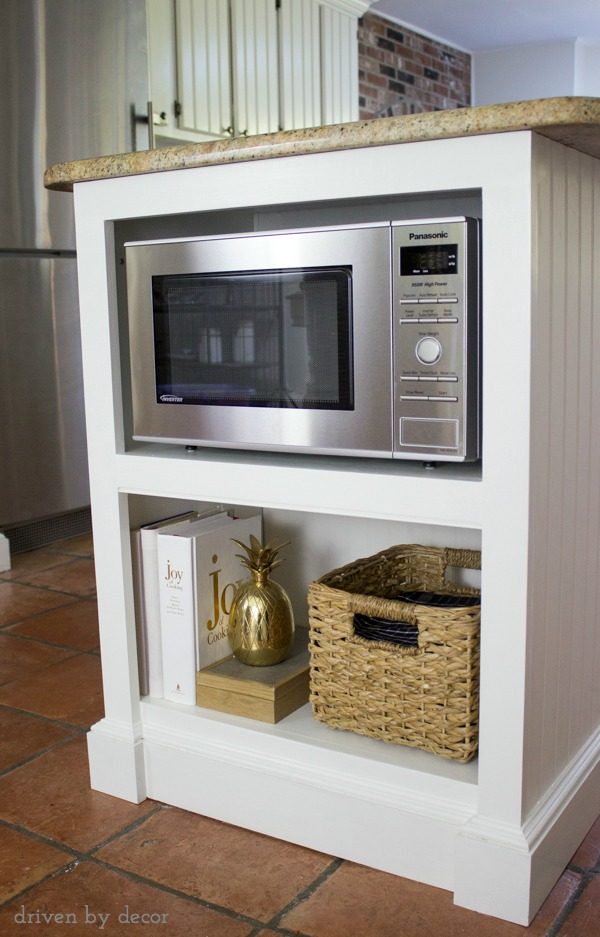Shelves for microwave, cookbooks, and other kitchen accessories added to island