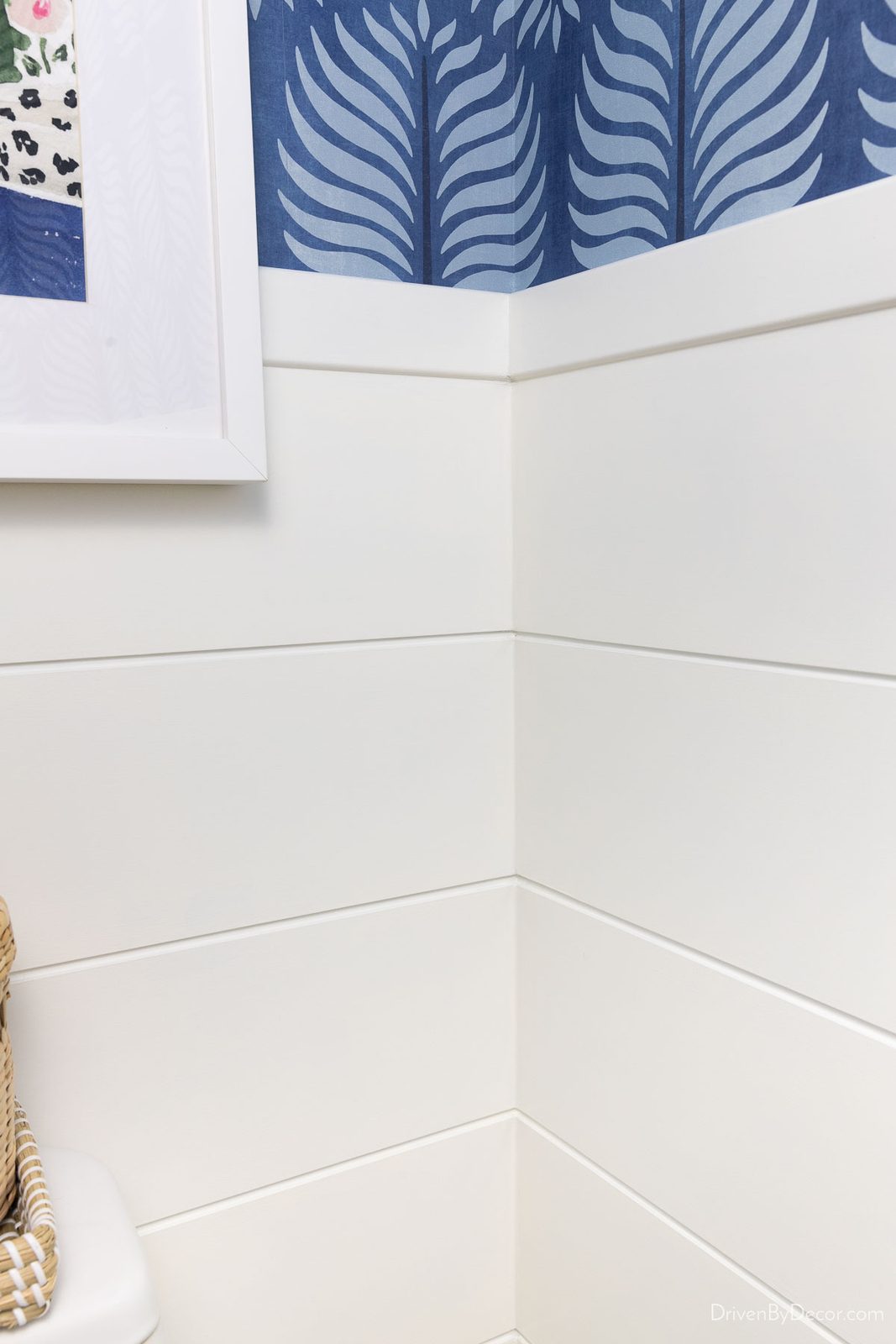 Shiplap on bottom half of wall in bathroom