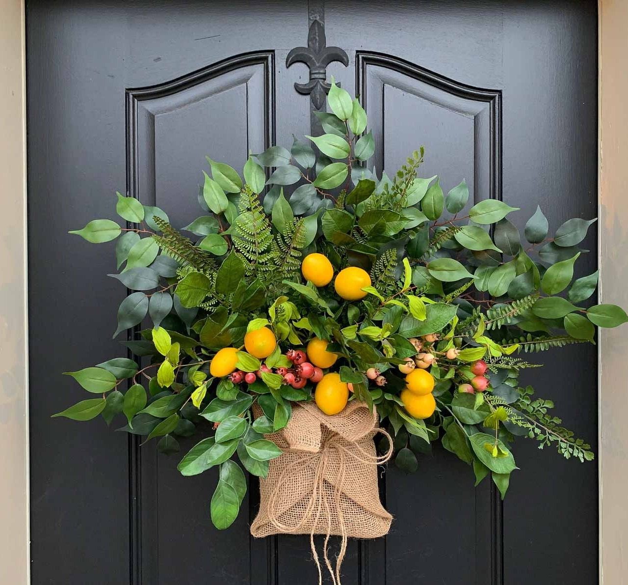 Love this spring "wreath" that looks like a colorful burlap wrapped bouquet!