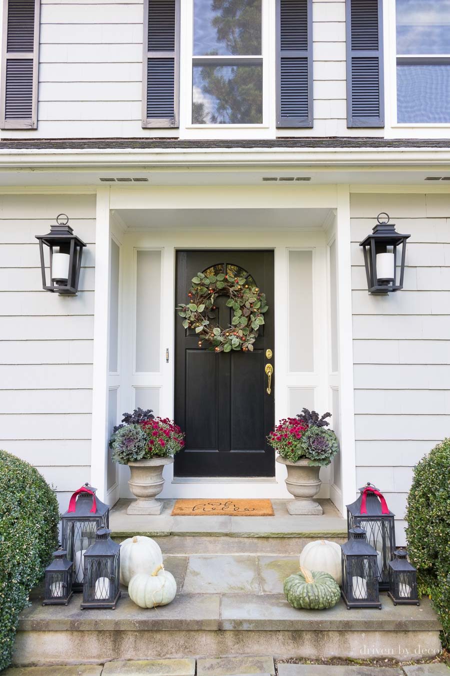 My fall front porch before I went to town on cleaning the dirty stone - click through for the "after" click and cleaning tips!